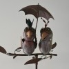 Couple d'oiseaux sur pique
