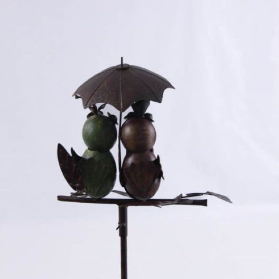 Couple d'oiseaux sur pique