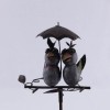 Couple d'oiseaux sur pique